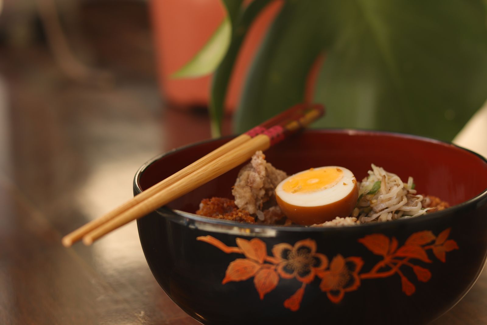 The tonkotsu pot at hour sixteen, aromatics just in